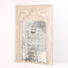 A French Louis XVI Style Carved Trumeau Mirror, late 19th C.
