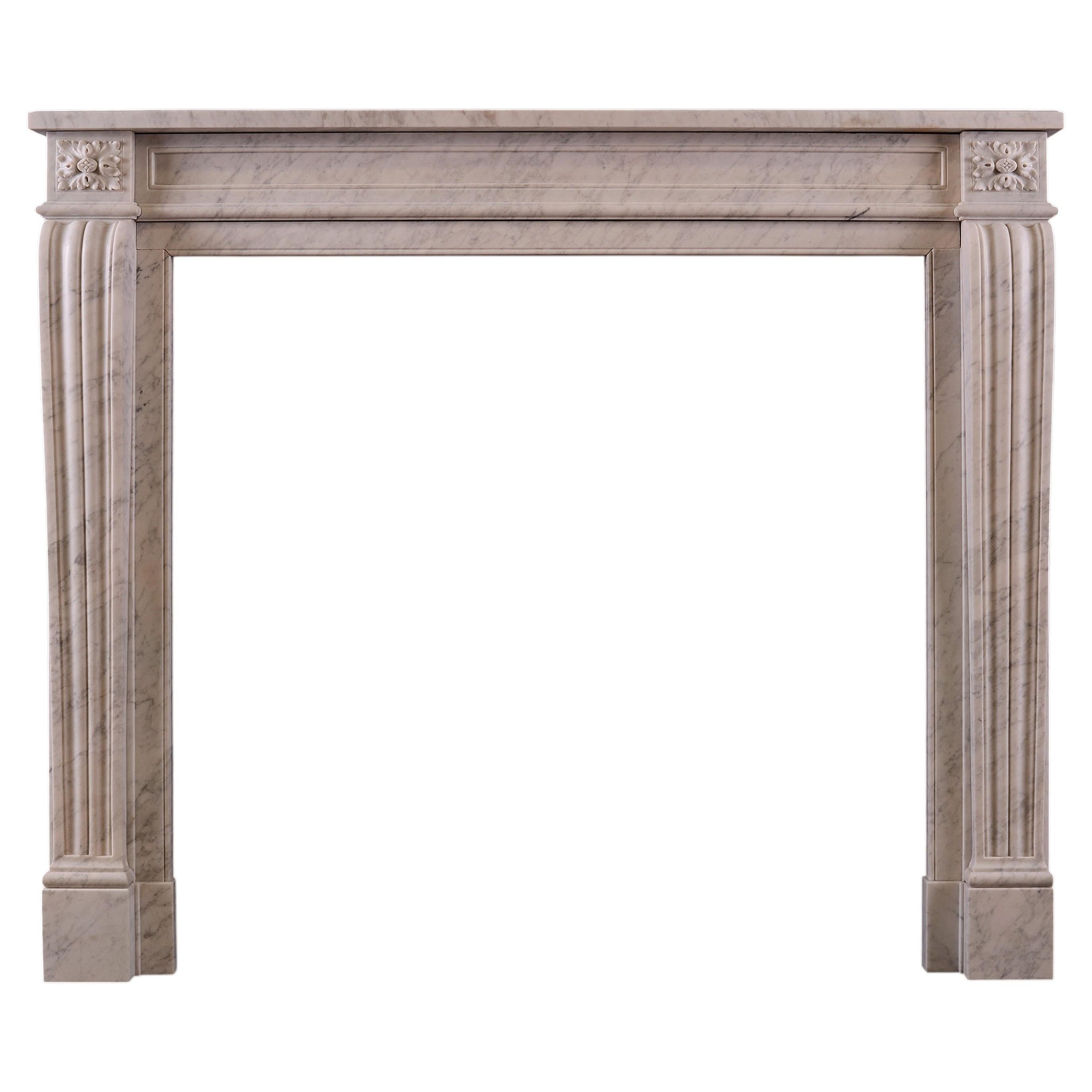 A French Louis XVI Style Fireplace in Italian Carrara Marble