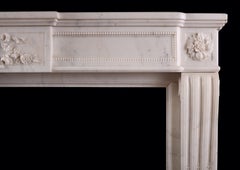A French Louis XVI Style Fireplace in Statuary White Marble