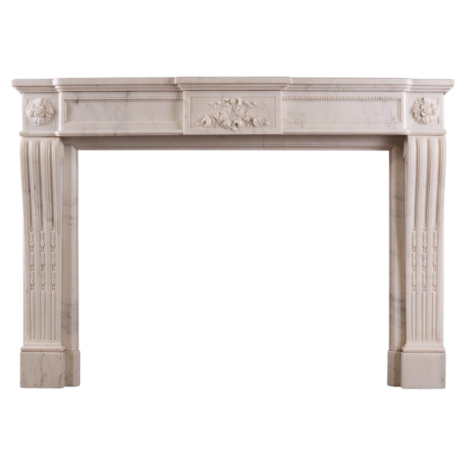 A French Louis XVI Style Fireplace in Statuary White Marble For Sale