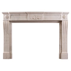 Antique A French Louis XVI Style Fireplace in Statuary White Marble