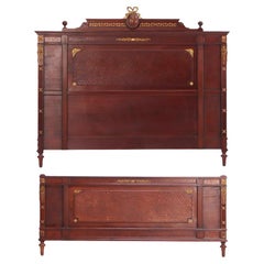 A French Louis XVI style king size headboard and footboard, C. 1900.