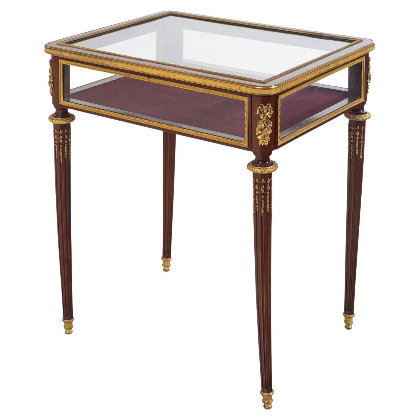 A French Louis XVI style Ormolu-Mounted Mahogany Vitrine Table, C. 1880, attributed to Paul Sormani.

Very good quality, nice ormolu mounts throughout, presents very well. 

Measures: 30