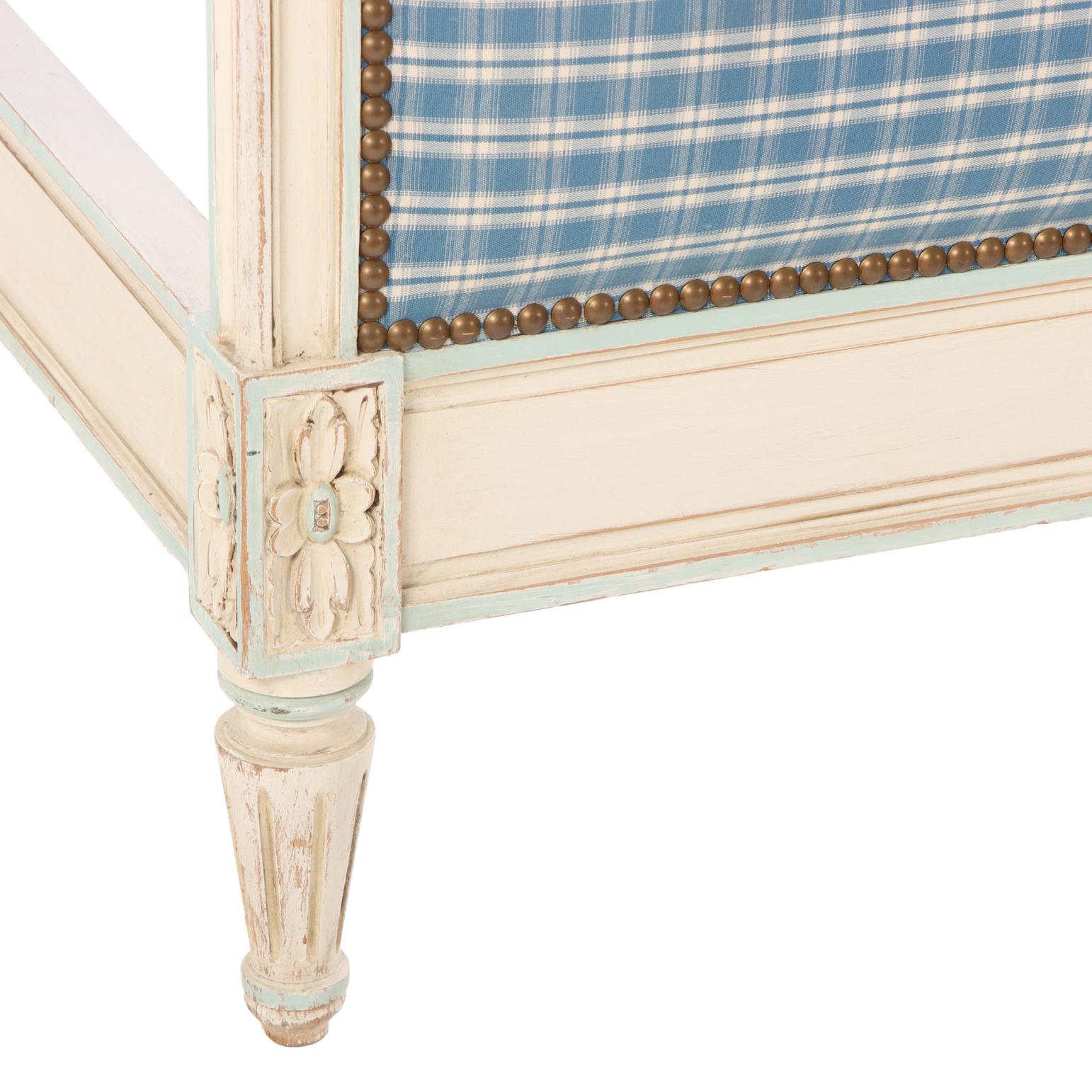 A French Louis XVI style painted and carved queen bed, C. 1920. In Good Condition For Sale In Philadelphia, PA