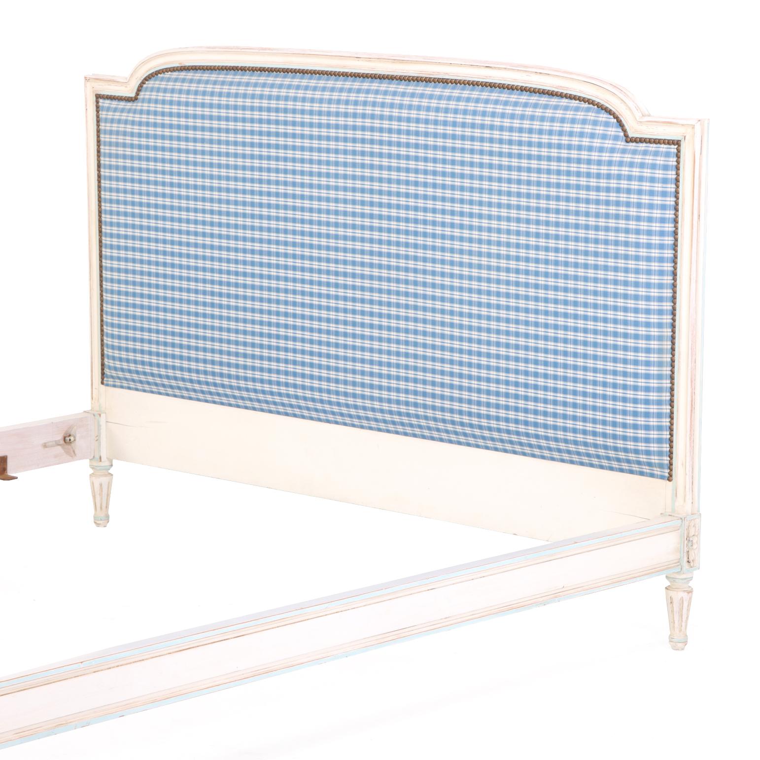 20th Century A French Louis XVI style painted and carved queen bed, C. 1920. For Sale