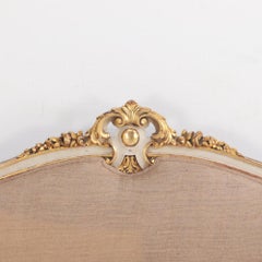 A French Louis XVI style Painted & Gilded Queen Size Bed, C. 1910.