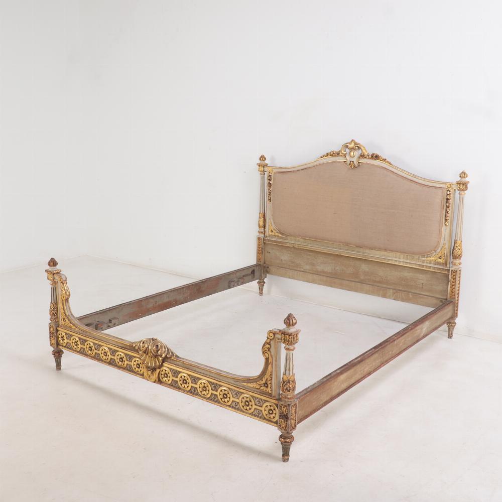 A French Louis XVI style Painted & Gilded Queen Size Bed, C. 1910. In Good Condition In Philadelphia, PA
