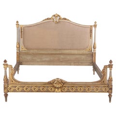 Antique A French Louis XVI style Painted & Gilded Queen Size Bed, C. 1910.