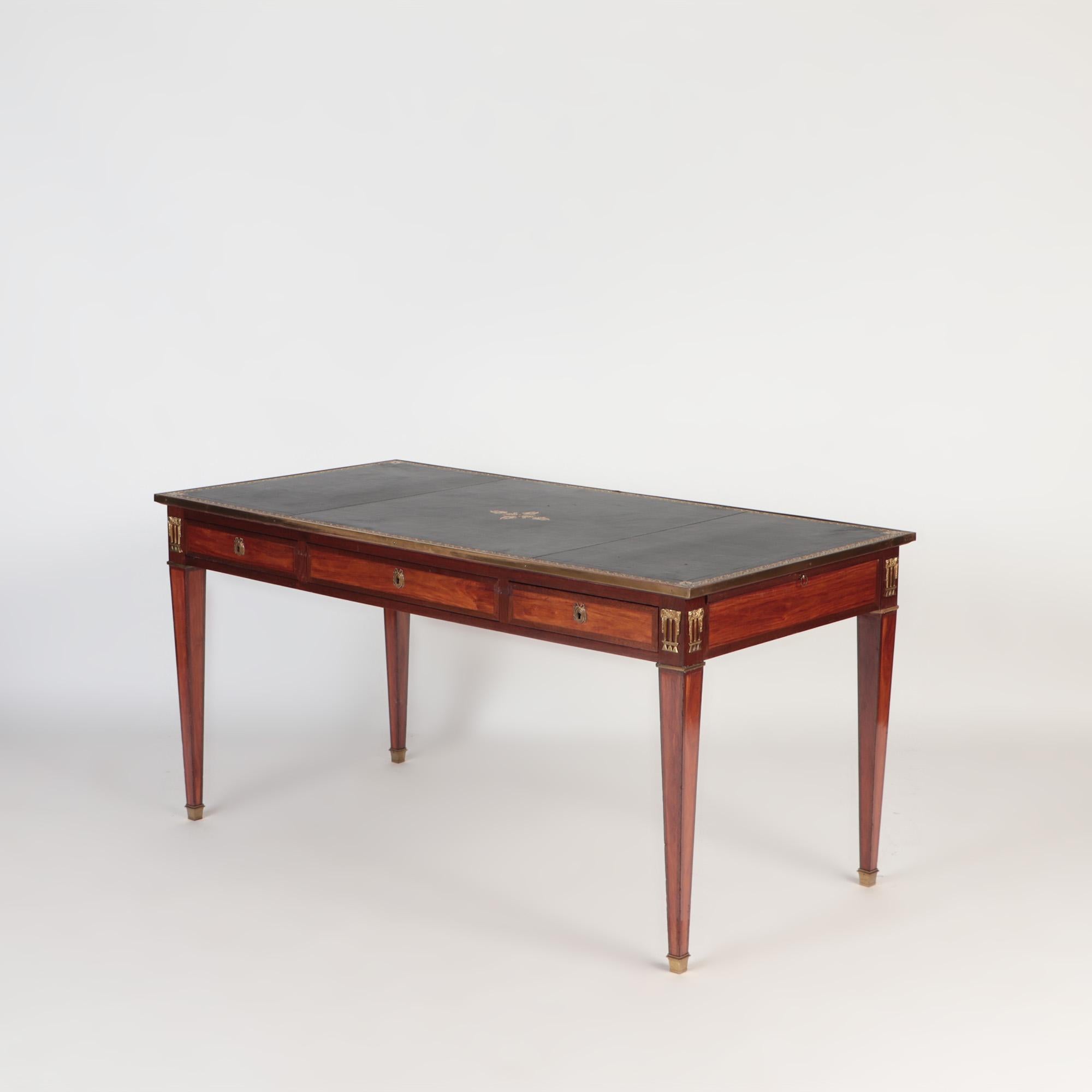 A French Louis XVI style three drawers writing desk or bureau plat, 19th C. In Good Condition In Philadelphia, PA