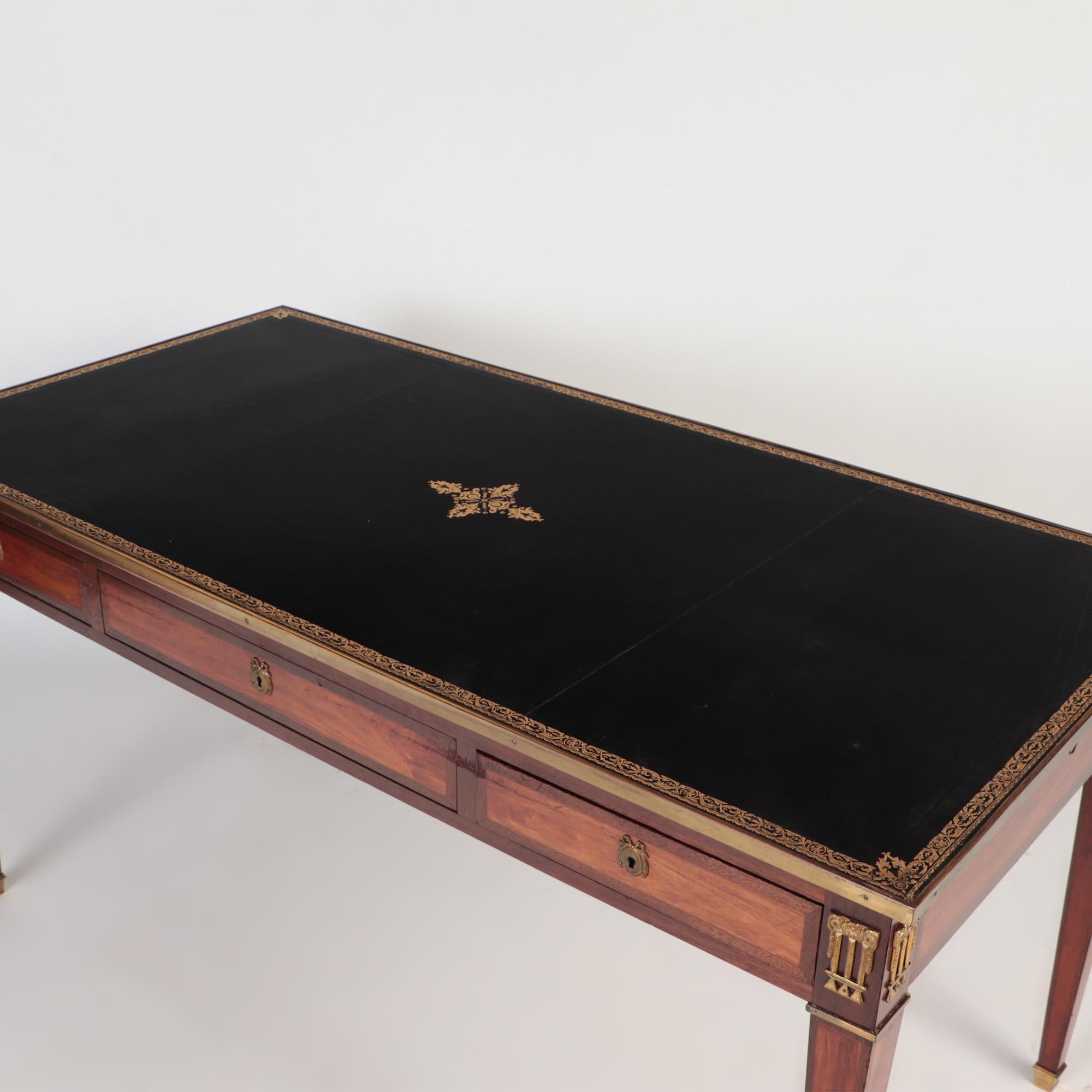 19th Century A French Louis XVI style three drawers writing desk or bureau plat, 19th C.