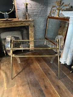 A French Lucite And Brass Console Table