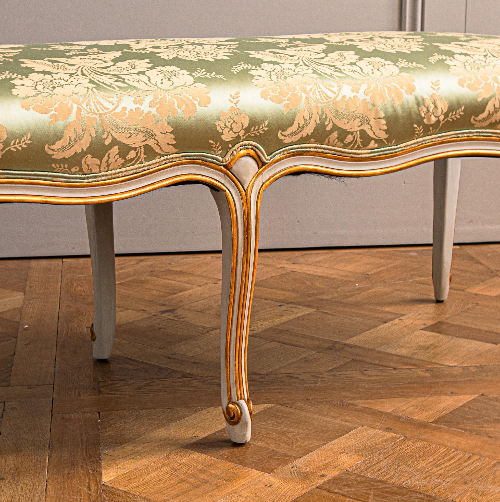 Hand-Carved A French LXV Style Giltwood & Painted Bench Hand Made By La Maison London For Sale