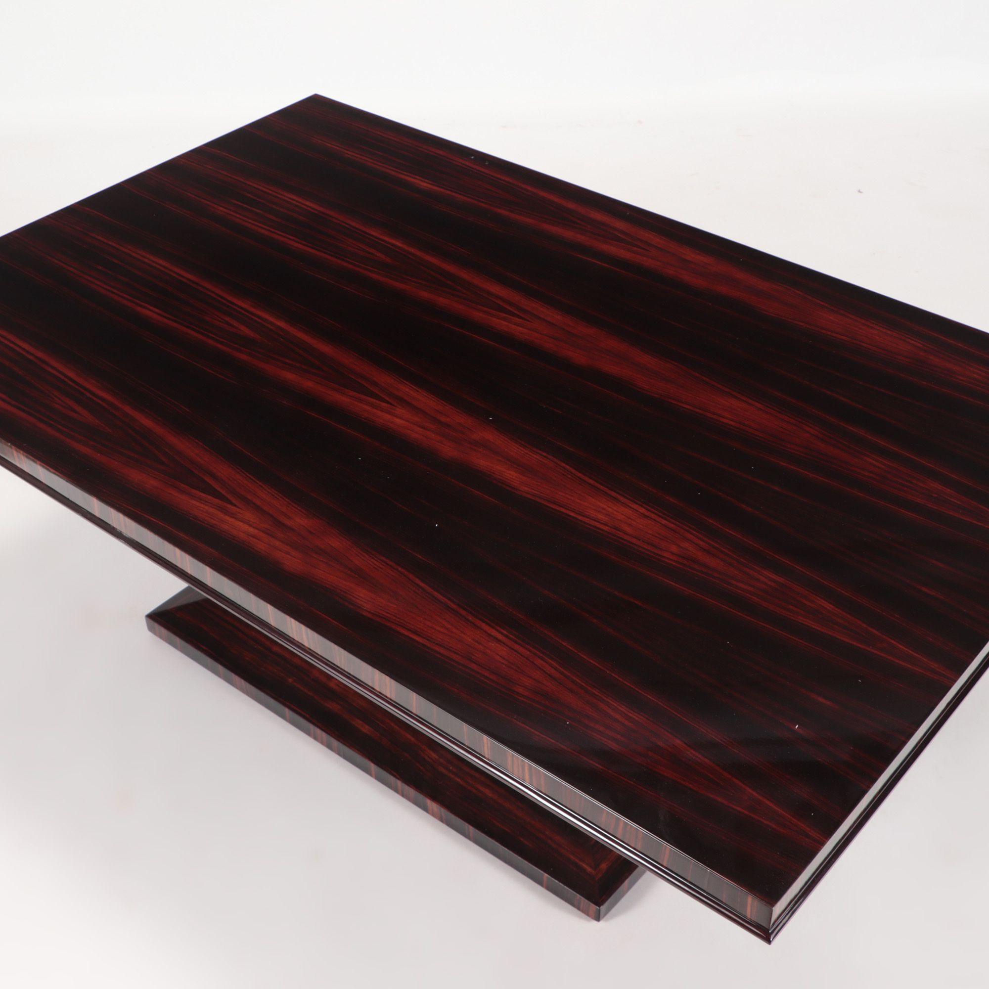 A French macassar ebony coffee table in the manner of Ruhlmann. Made by Romeo Furniture, Paris, France.  