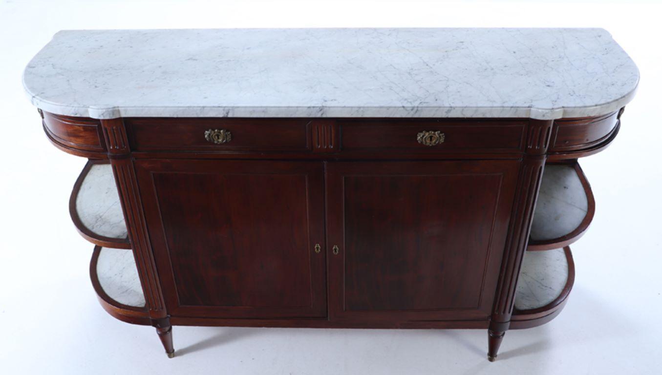 A French mahogany sideboard circa 1920 having a white marble top with open sides In Good Condition For Sale In Philadelphia, PA