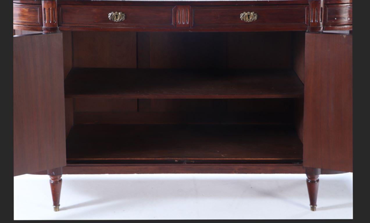 Mirror A French mahogany sideboard circa 1920 having a white marble top with open sides For Sale