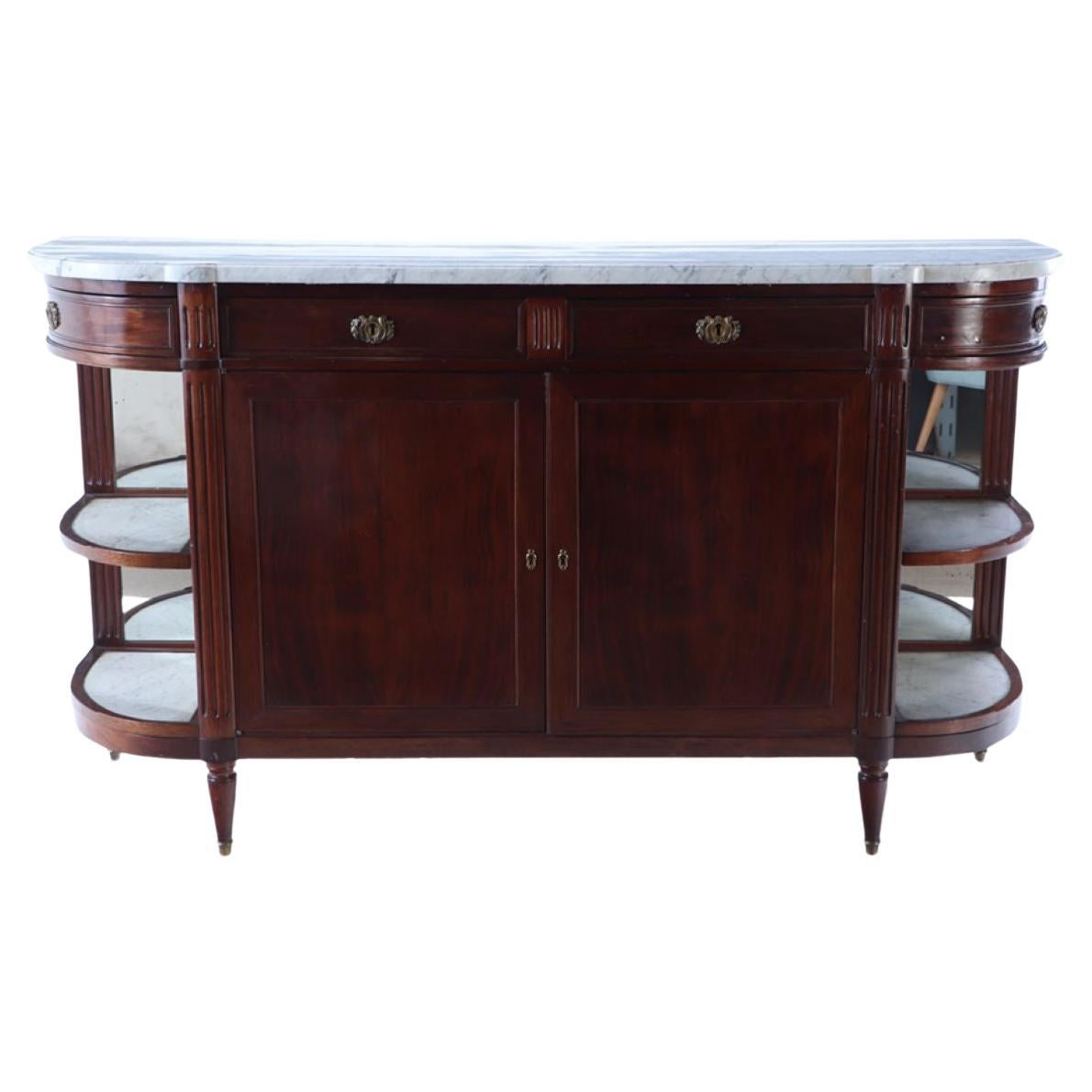 A French mahogany sideboard circa 1920 having a white marble top with open sides For Sale