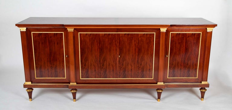 A French Mahogany & Speckled Mahogany Veneered Sideboard by Maurice Rinck A French Mahogany & Speckled Mahogany Veneered Sideboard by Maurice Rinck