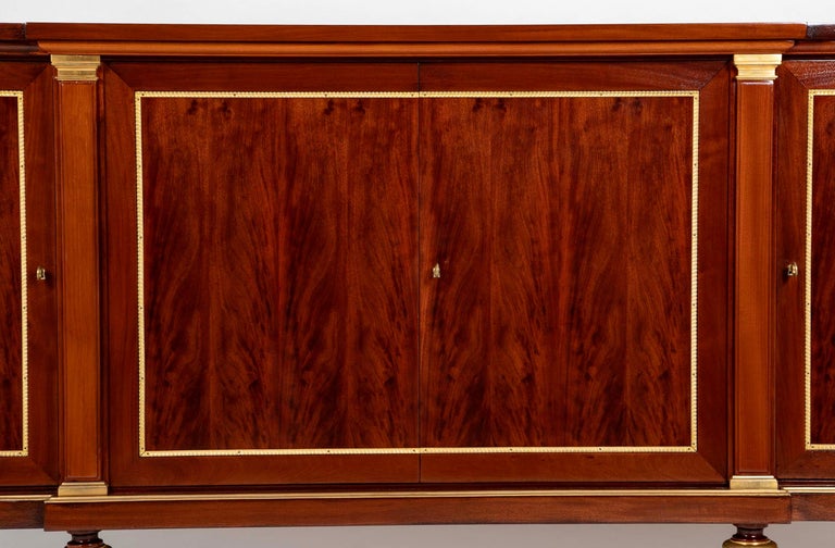 A French Mahogany & Speckled Mahogany Veneered Sideboard by Maurice Rinck A French Mahogany & Speckled Mahogany Veneered Sideboard by Maurice Rinck