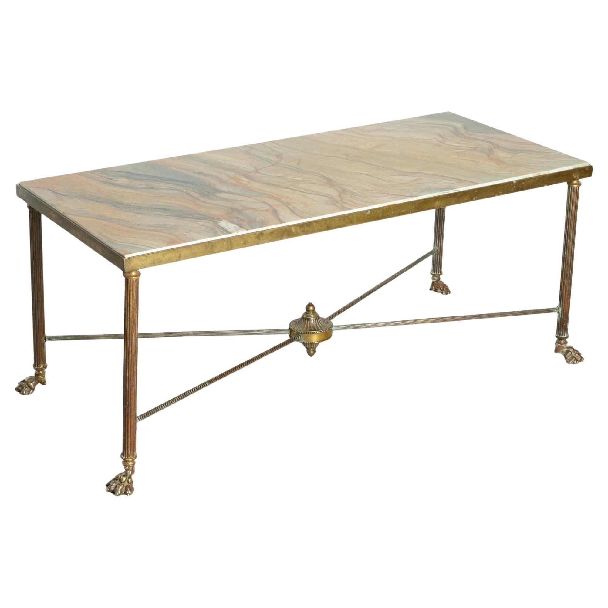 A French 1920's Marble and Brass Coffee Table Lion paw Feet Maison Baguès