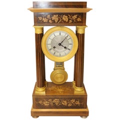 French Marquetry and Ormolu Mounted 14 Day Striking Portico Clock, circa 1830