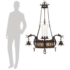 A French mid 19th century Renaissance st. Wrought Iron and Glass chandelier