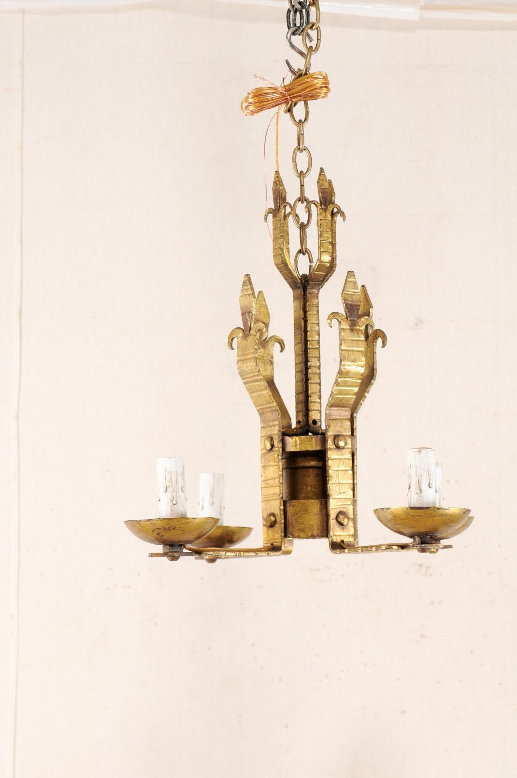 French Mid-20th Century Four-Light Gold Iron Chandelier in Fleur de Lys Motif For Sale 7
