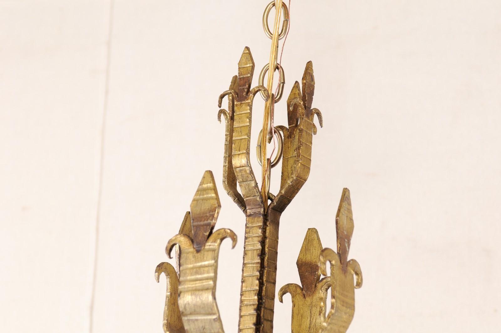French Mid-20th Century Four-Light Gold Iron Chandelier in Fleur de Lys Motif For Sale 2