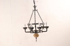 French Midcentury Forged Iron Chandelier with a Carved Wood Sphere Accent