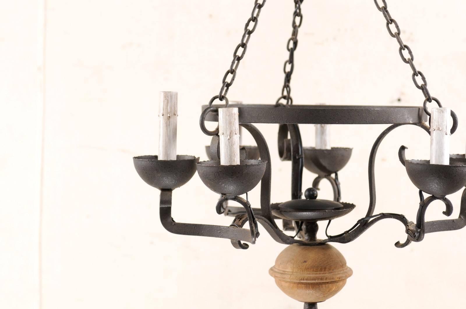 French Midcentury Forged Iron Chandelier with a Carved Wood Sphere Accent In Good Condition In Atlanta, GA