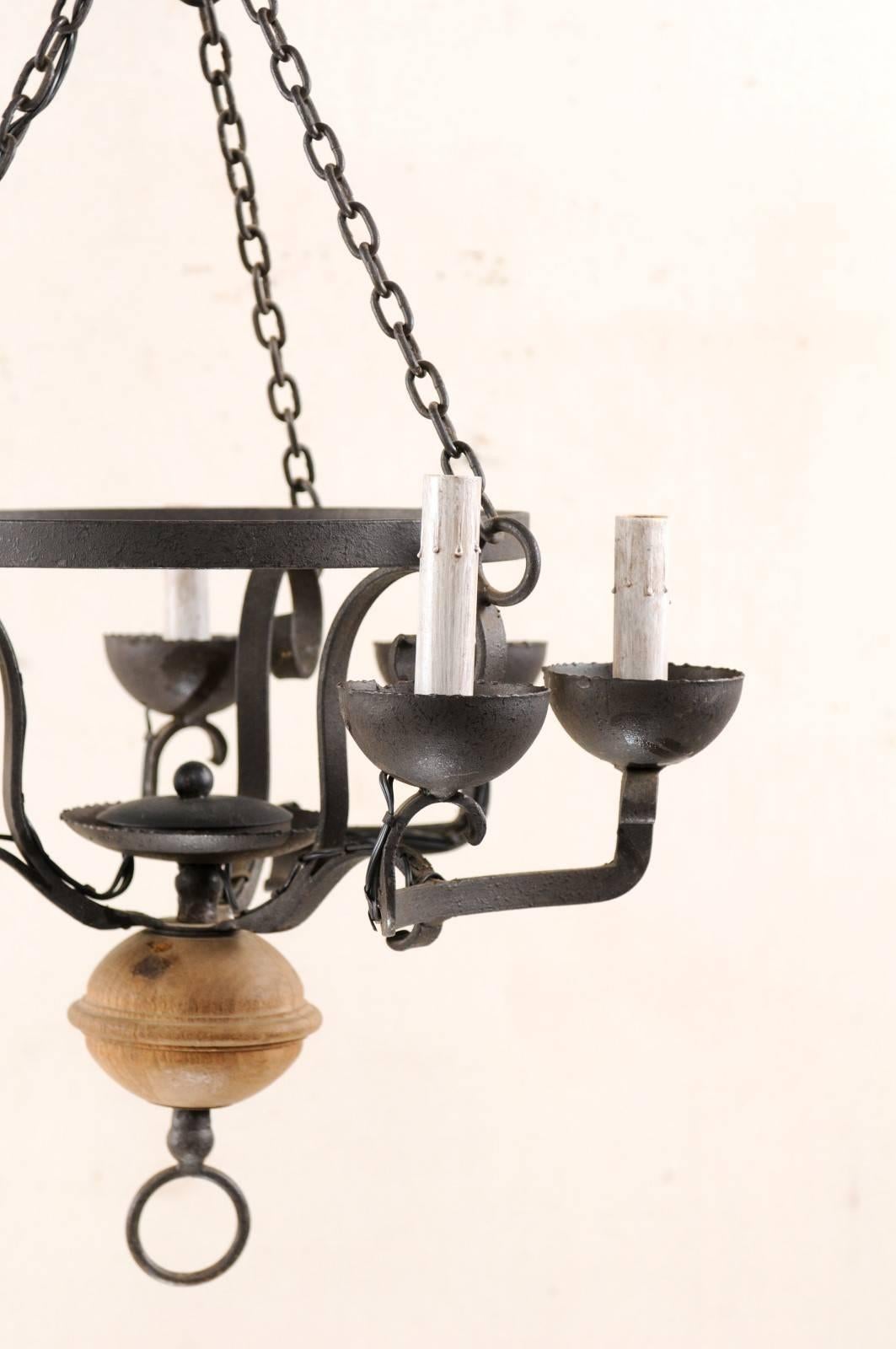 French Midcentury Forged Iron Chandelier with a Carved Wood Sphere Accent 2