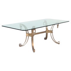 Vintage A French Modern Solid bronze dining table having a glass top C 1940. 
