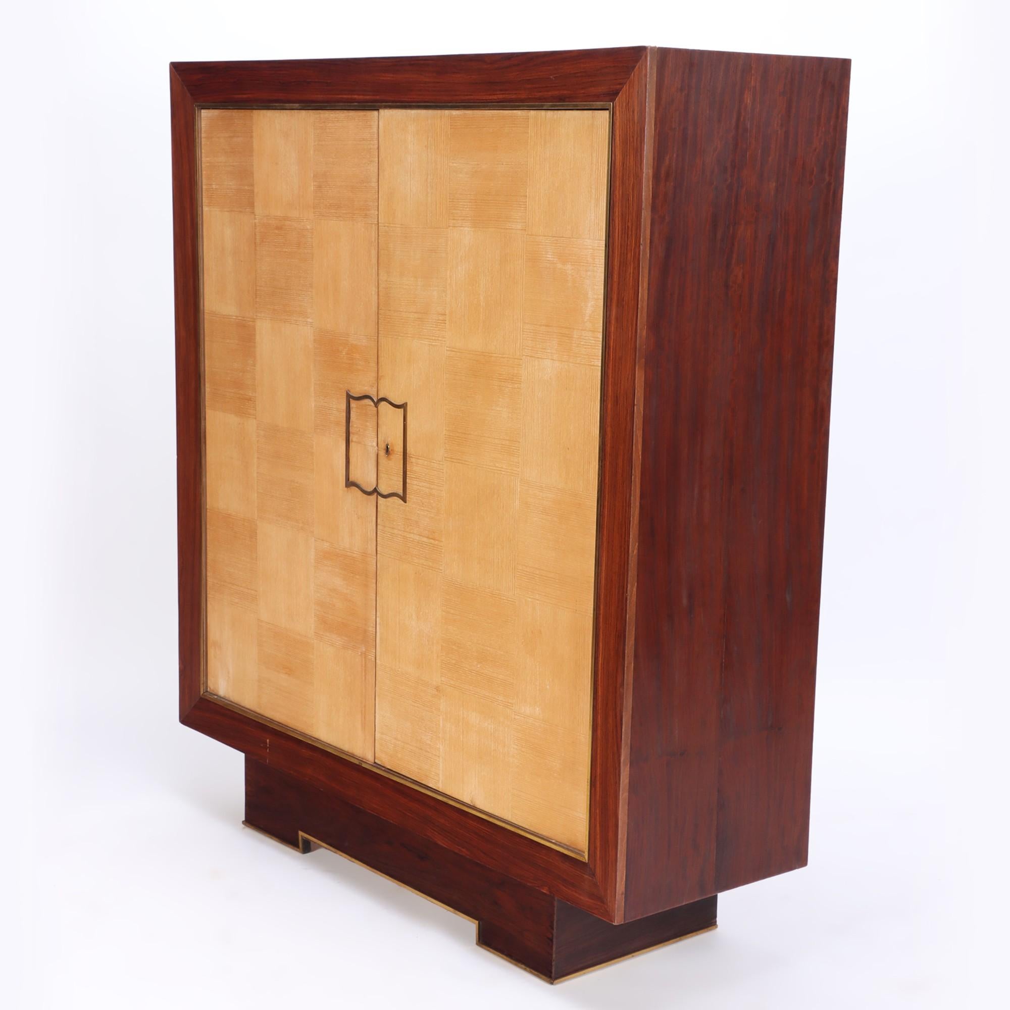 Modern A two door cabinet designed by Jean Royere for Gouffe C 1935