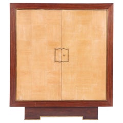 A two door cabinet designed by Jean Royere for Gouffe C 1935