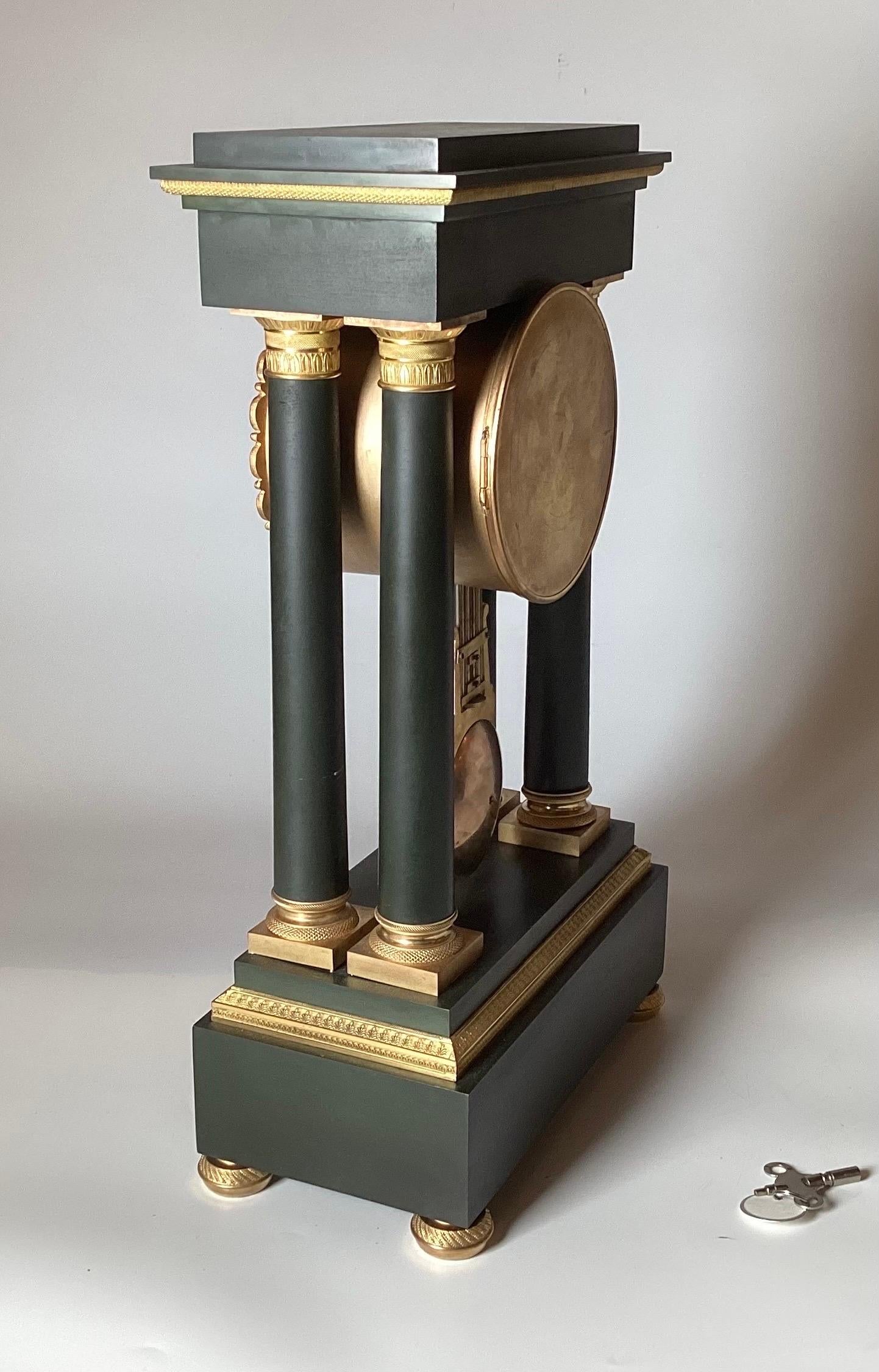 A French Neoclassical Style Gilt and Patinated Bronze Portico Clock Circa 1875 For Sale 3