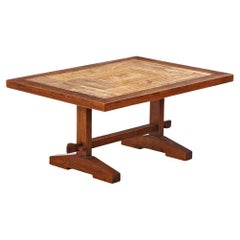 A French oak and stone coffee table, C. 1940.
