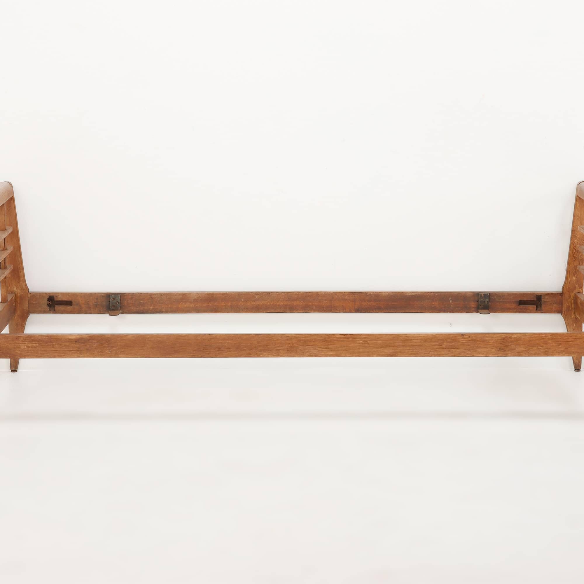 French oak daybed  C 1940. We have a pair so could be used as twin beds. would make a nice sofa as well. comes apart for transport or stairs. Interior Dimensions 31.25
