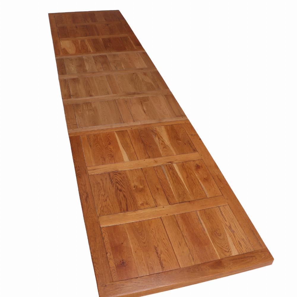 A French oak farm table, of unusually large size, C. 1970. In Good Condition For Sale In Philadelphia, PA