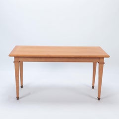 A French Oak Library Table, in the manner of Jacques Adnet, C. 1940.