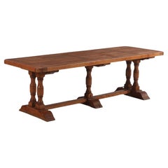 A French oak trestle table, late 19th C.