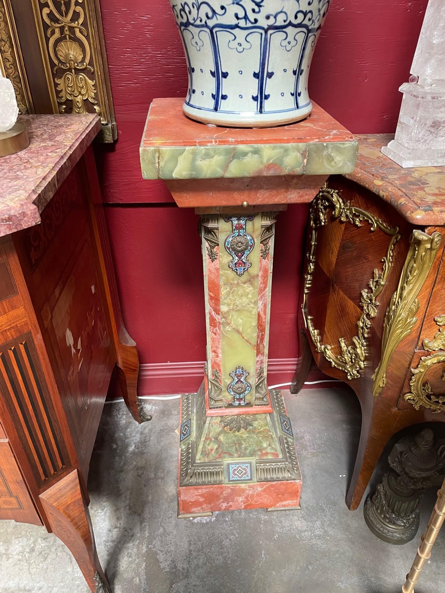 A French onyx and champlevé enamel pedestal 8