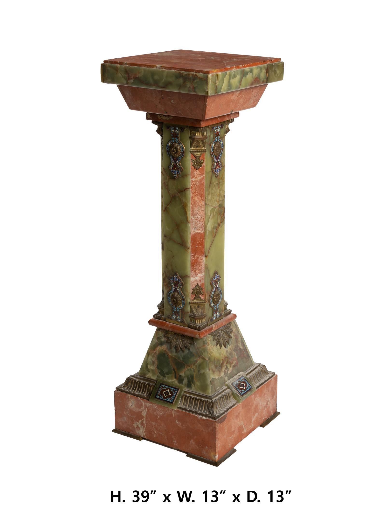 Fabulous French onyx and reddish marble pedestal enhanced with beautiful champleve panels
Fourth-quarter 19th Century 
The onyx and reddish marble pedestal with square top over an octagonal column and raised on a tapering square base, finished with