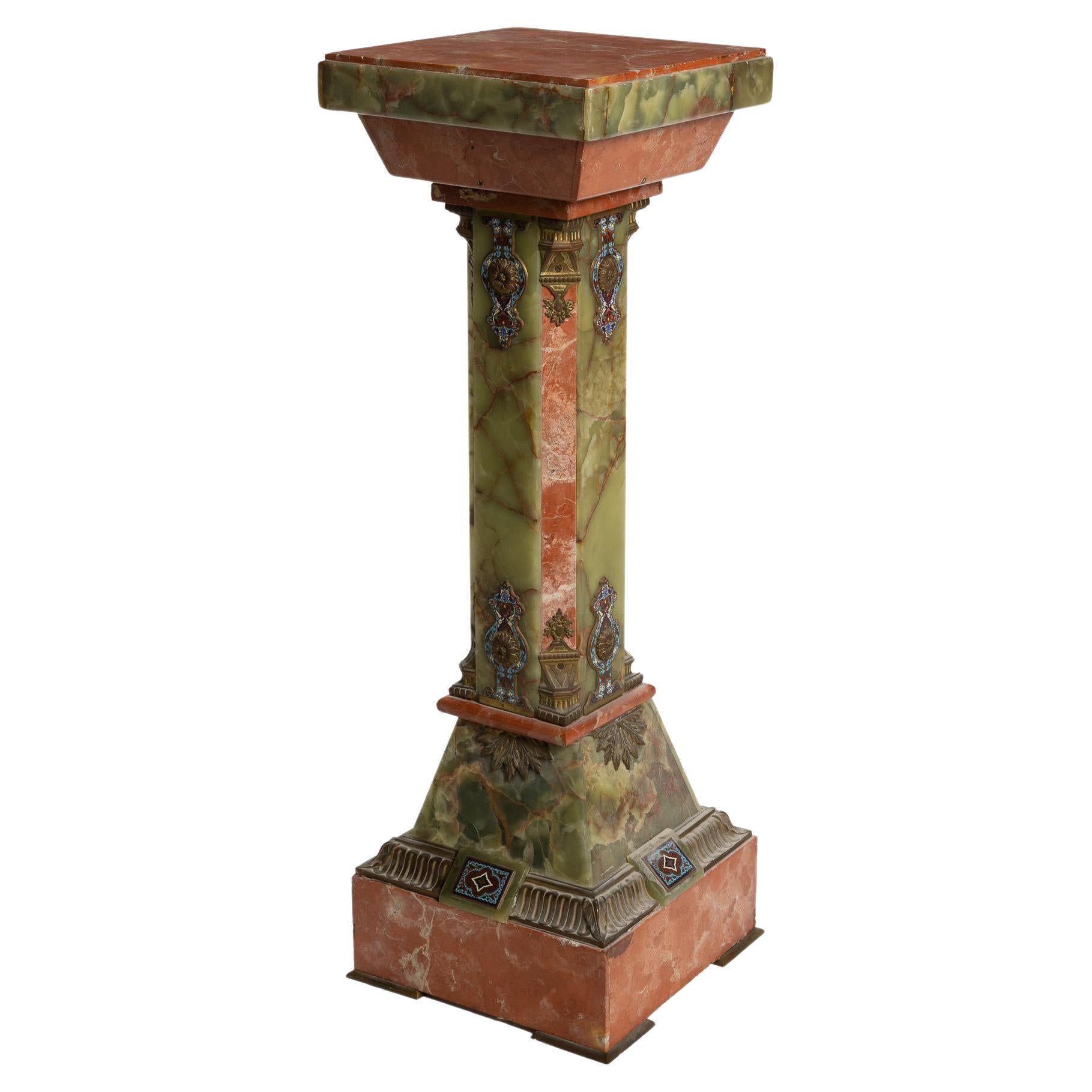 A French onyx and champlevé enamel pedestal