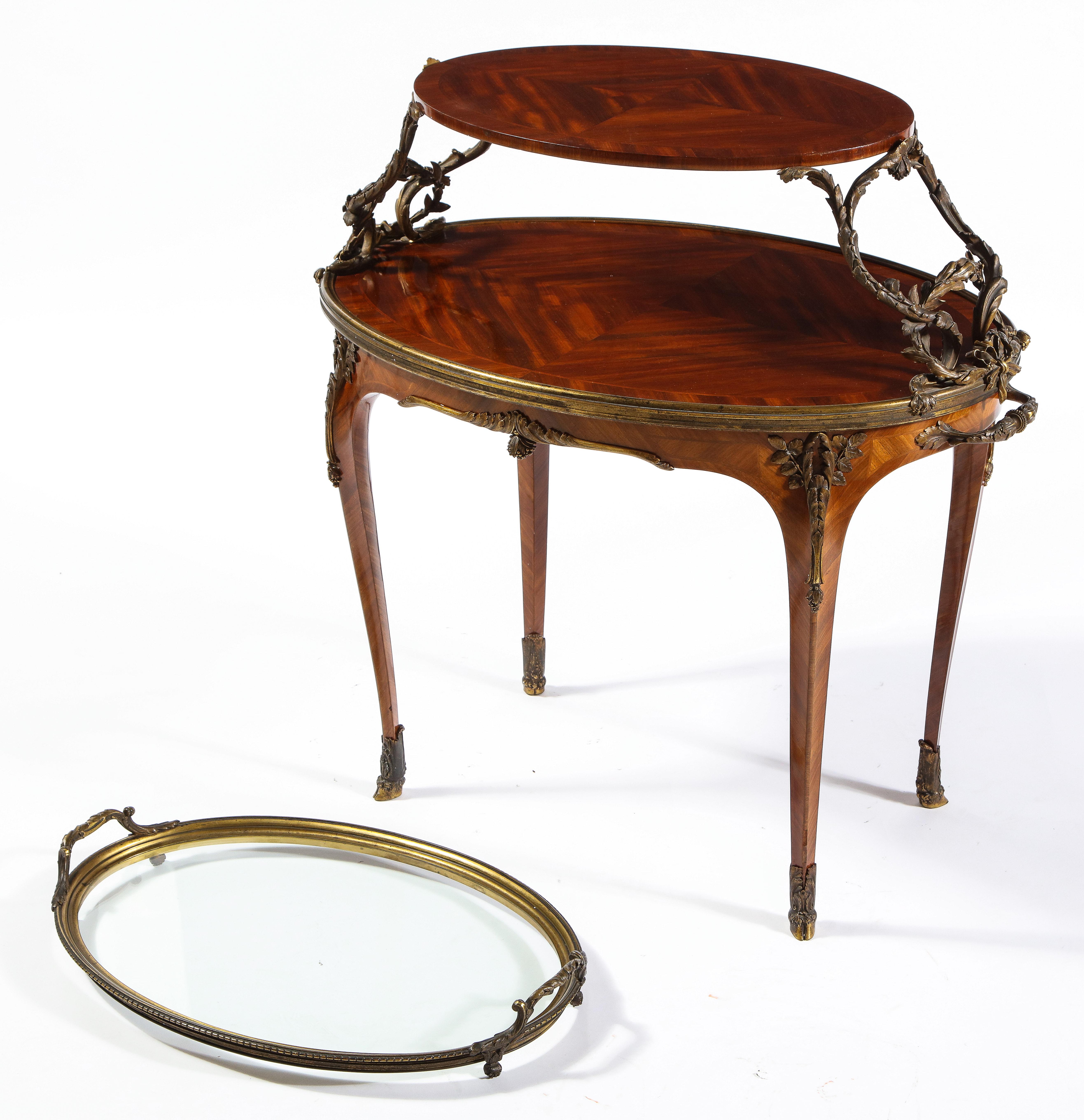 Hand-Carved French Ormolu-Mounted Mahogany Two-Tier Tea Table, Attributed to Paul Sormani For Sale