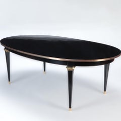 French Oval Ebonized Mahogany Dining Room Table with Bronze Mounts, circa 1940