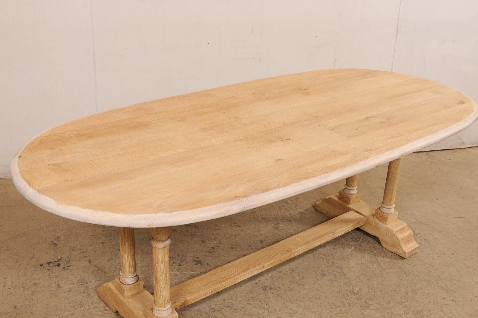 Oak A French Oval-Shaped Bleached Wood Trestle Dining Table, Mid 20th Century For Sale