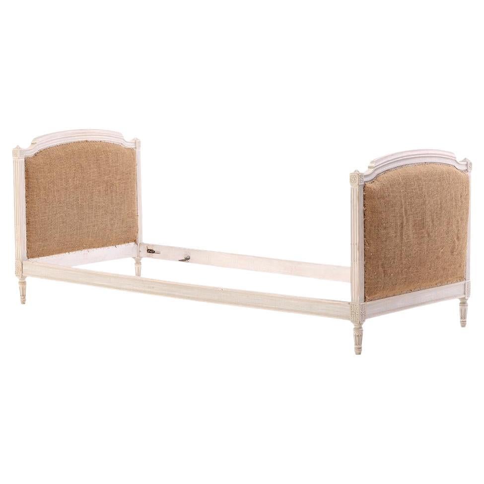 A French painted and carved daybed, C. 1900.