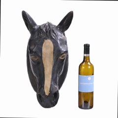 A French painted terracotta horse head, C. 1920.