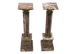 A French pair of marble columns pedestals, ca 1900