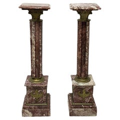 A French pair of marble columns pedestals, ca 1900