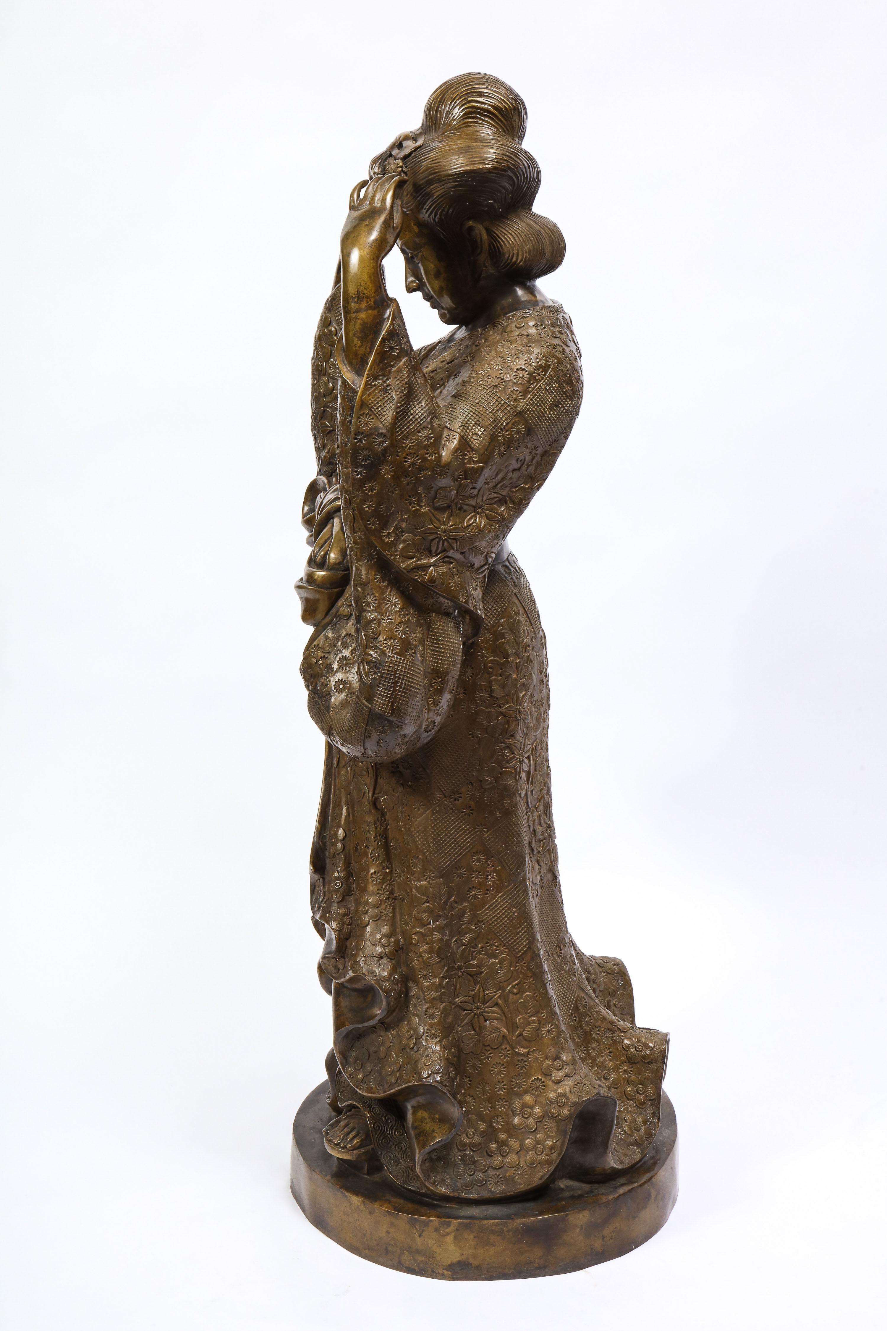 bronze geisha statue